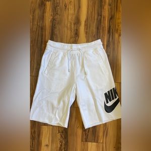 White Nike shorts
